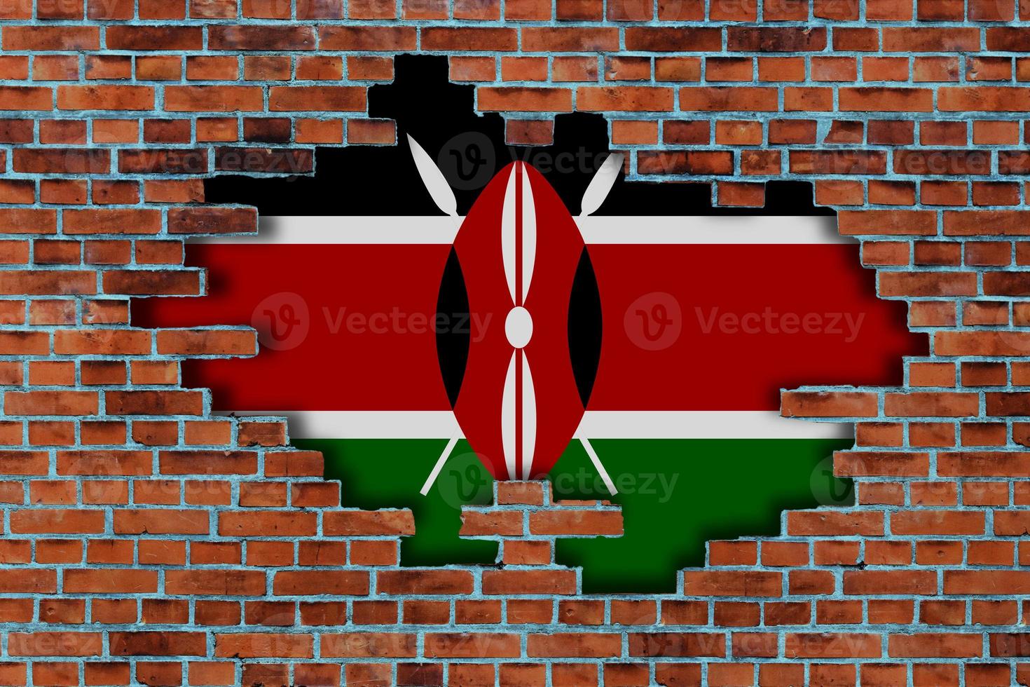 3D Flag of Kenya behind the broken old stone wall background. photo
