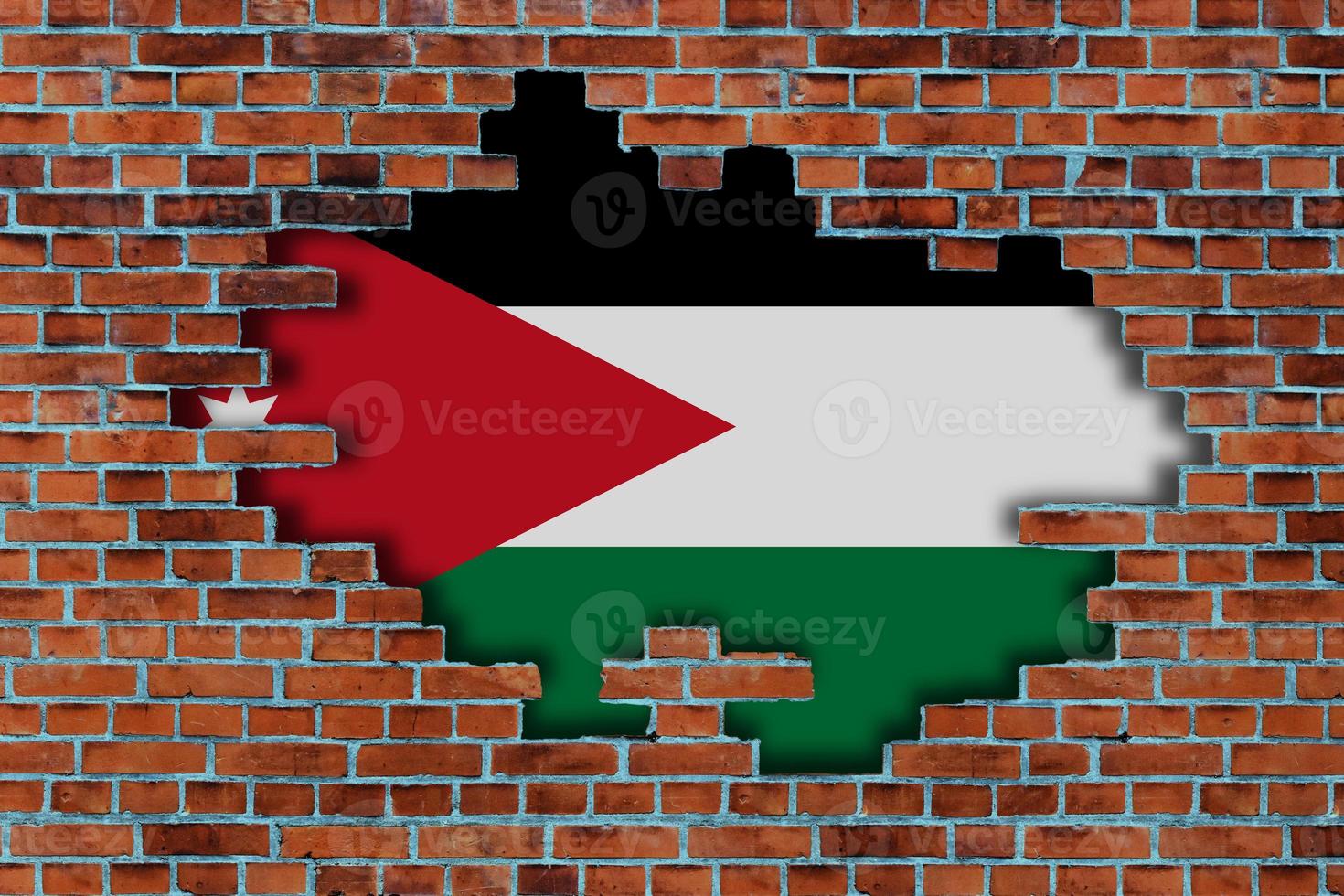 3D Flag of Jordan behind the broken old stone wall background. photo