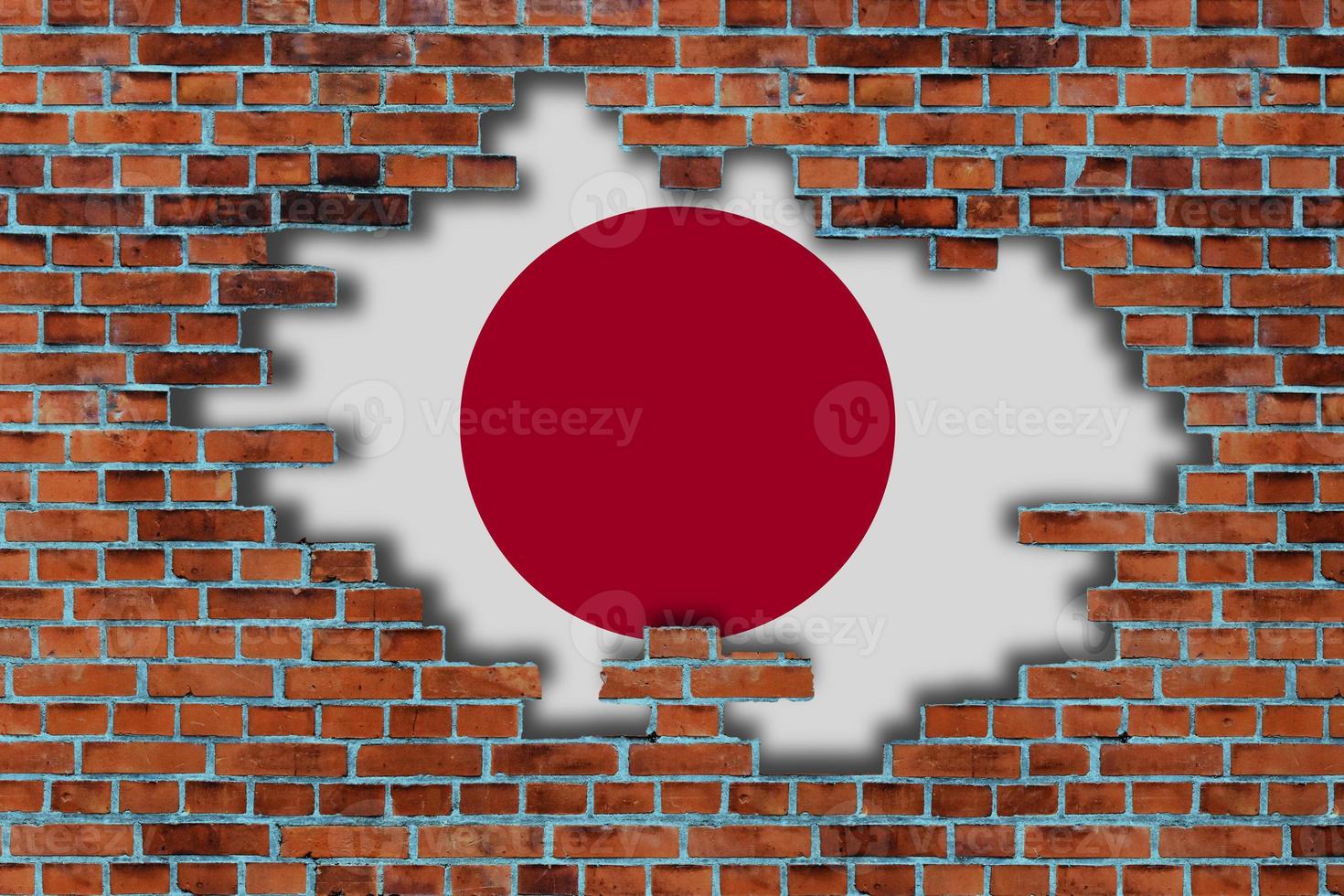 3D Flag of Japan behind the broken old stone wall background. photo