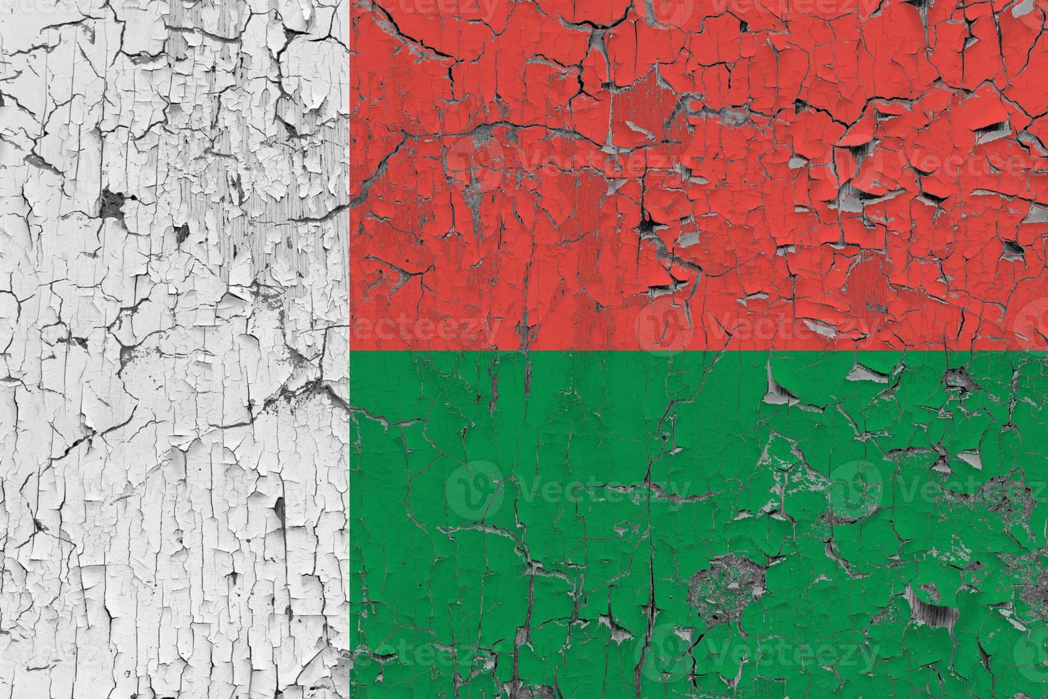 3D Flag of Madagascar on an old stone wall background. photo