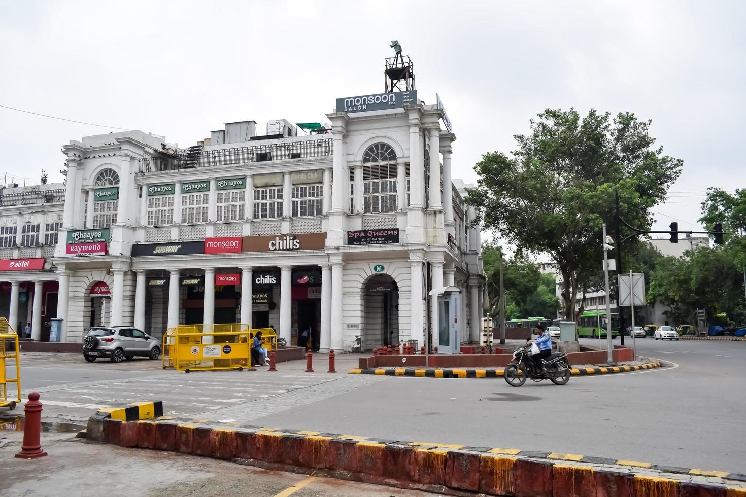 Delhi, India, March 31 2023 - Famous business district Connaught Place know as CP Delhi in the centre of New Delhi India with Offices, Banks and Shopping. British style architecture CP in Delhi, India photo