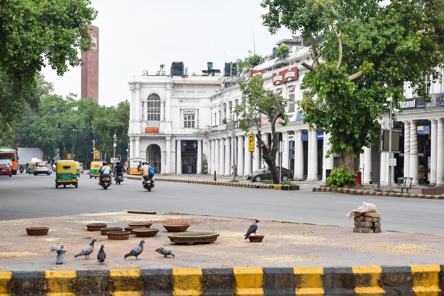 Delhi, India, March 31 2023 - Famous business district Connaught Place know as CP Delhi in the centre of New Delhi India with Offices, Banks and Shopping. British style architecture CP in Delhi, India photo
