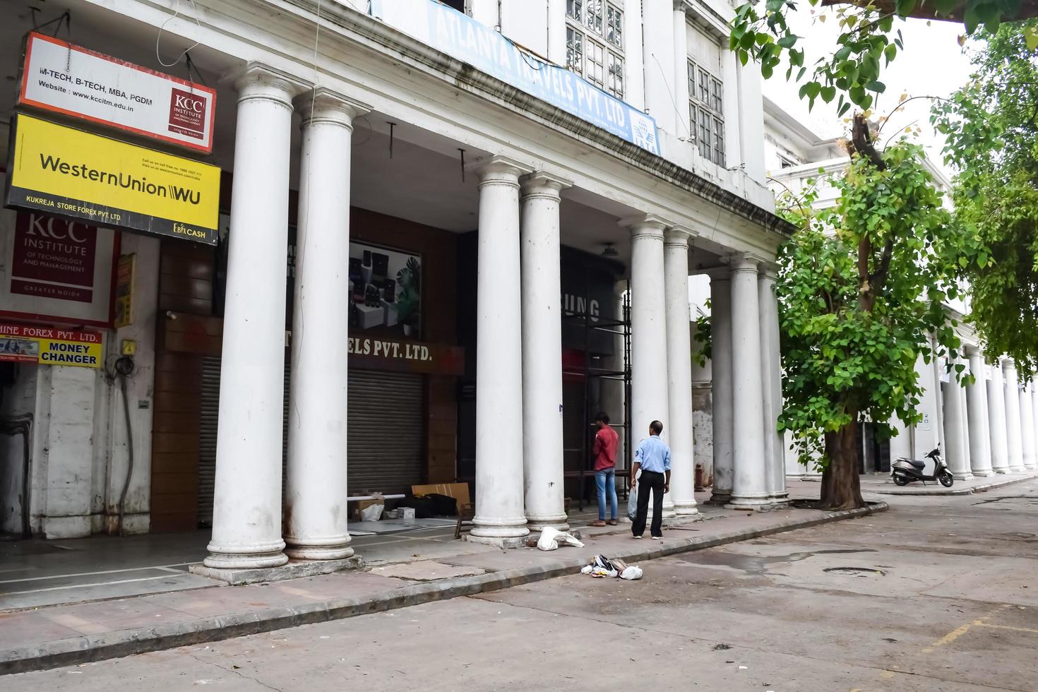 Delhi, India, March 31 2023 - Famous business district Connaught Place know as CP Delhi in the centre of New Delhi India with Offices, Banks and Shopping. British style architecture CP in Delhi, India photo