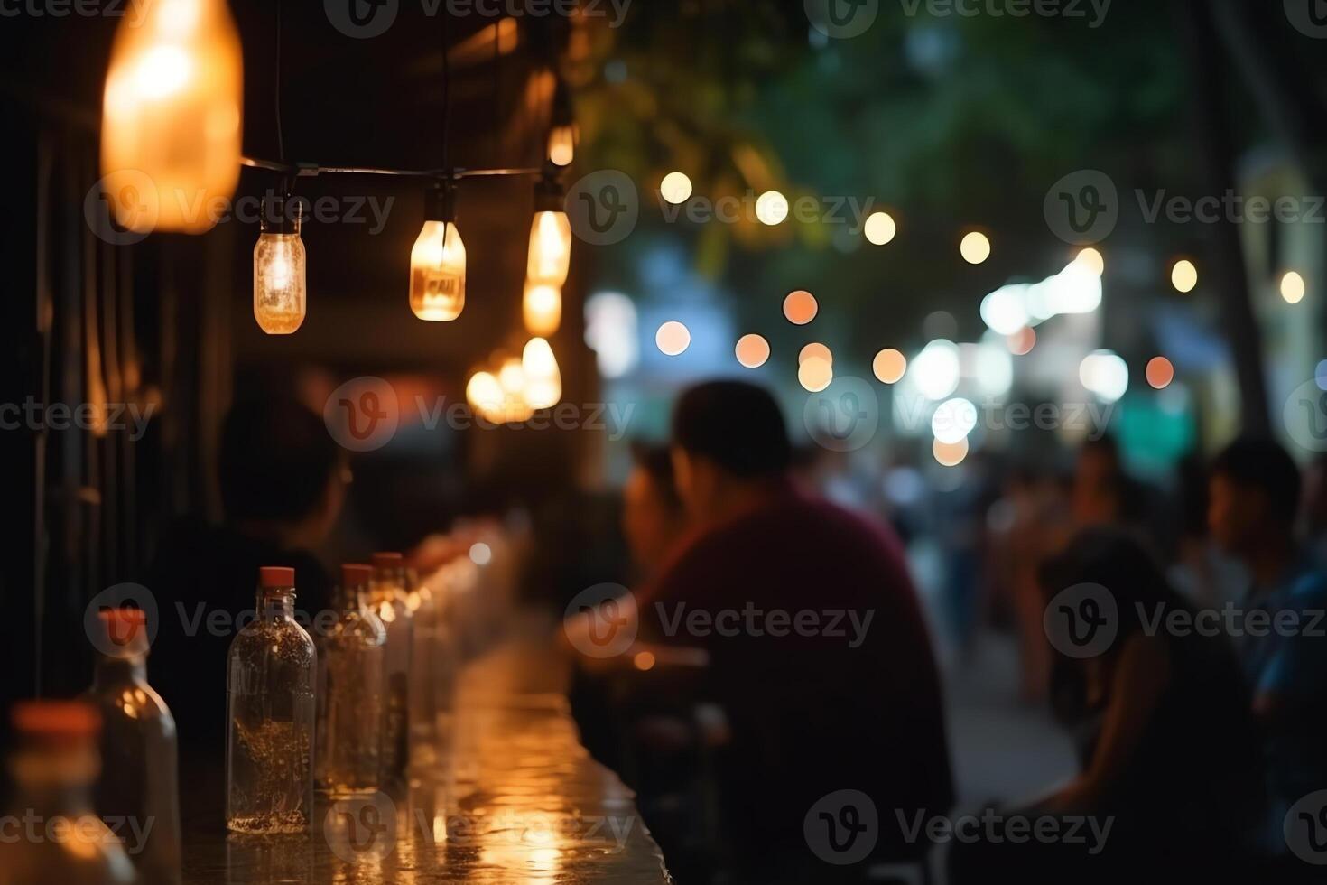 Bokeh background of outdoor Street Bar in Asia, people chill out and listen to music together. photo