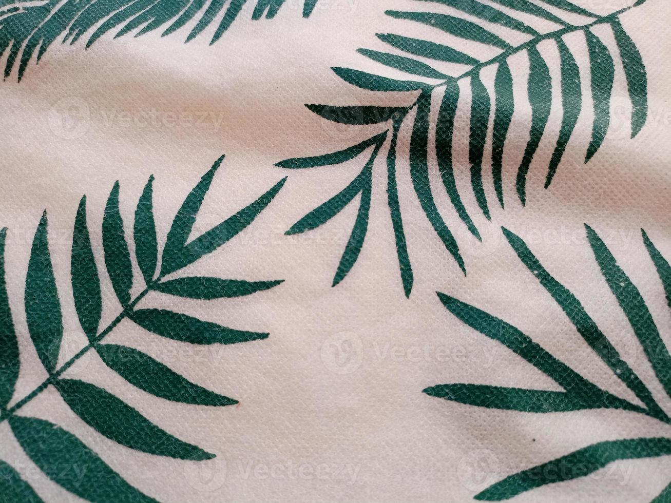 portrait of a cloth with a palm leaf pattern,Tropical leaves pattern palm plants. Green leaf monstera seamless photo
