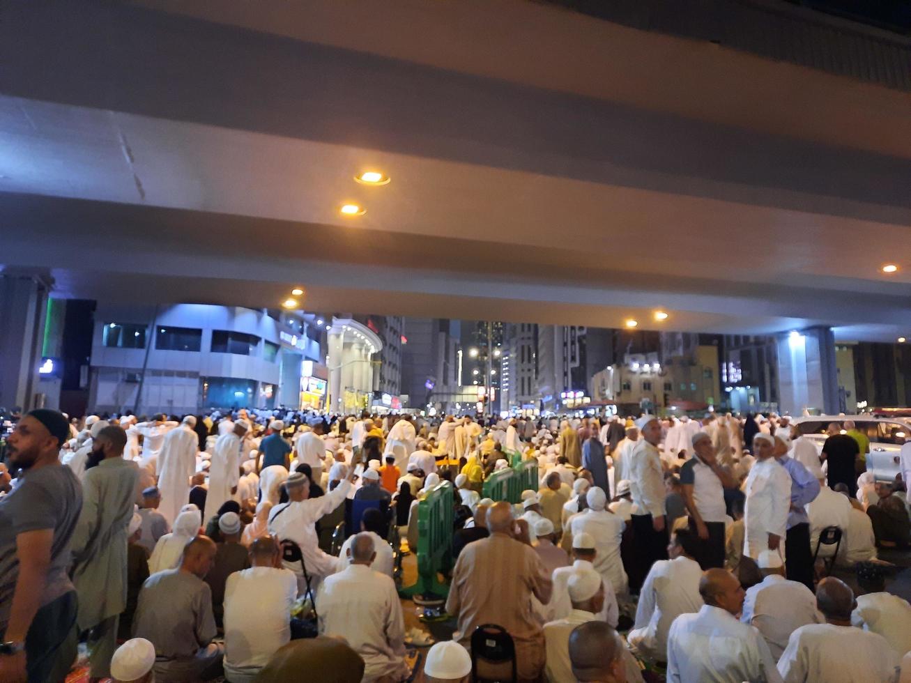 Mecca, Saudi Arabia, April 2023 - Pilgrims from different countries of the world are outside Masjid al-Haram, Makkah on the twenty-seventh night of Ramadan. photo