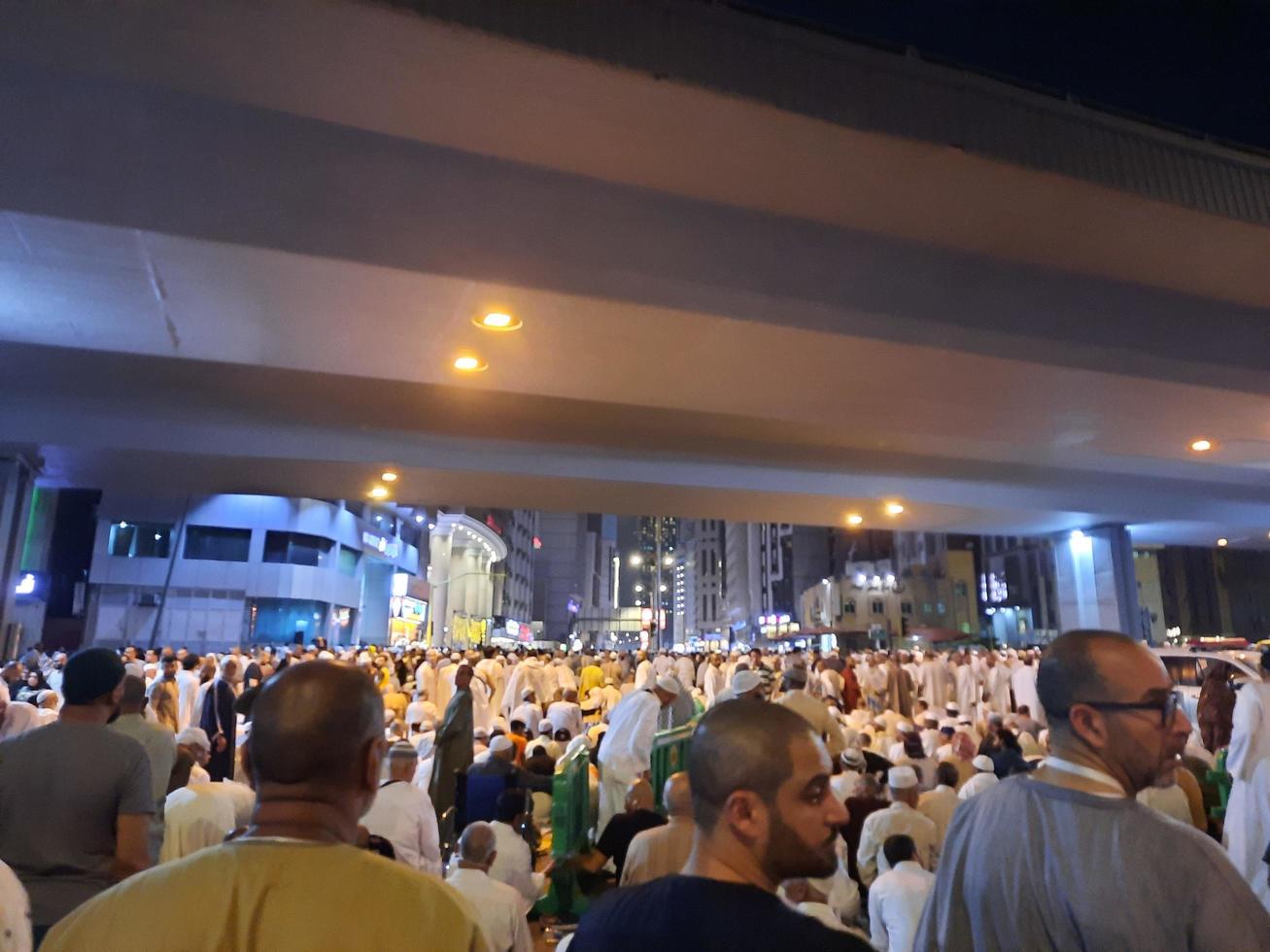 Mecca, Saudi Arabia, April 2023 - Pilgrims from different countries of the world are outside Masjid al-Haram, Makkah on the twenty-seventh night of Ramadan. photo