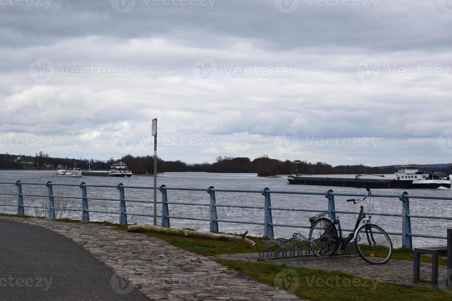 Bike at the Rhine and Ships on the Water photo