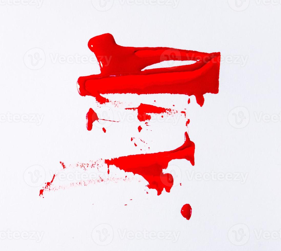 Red color cplash on the white background photo