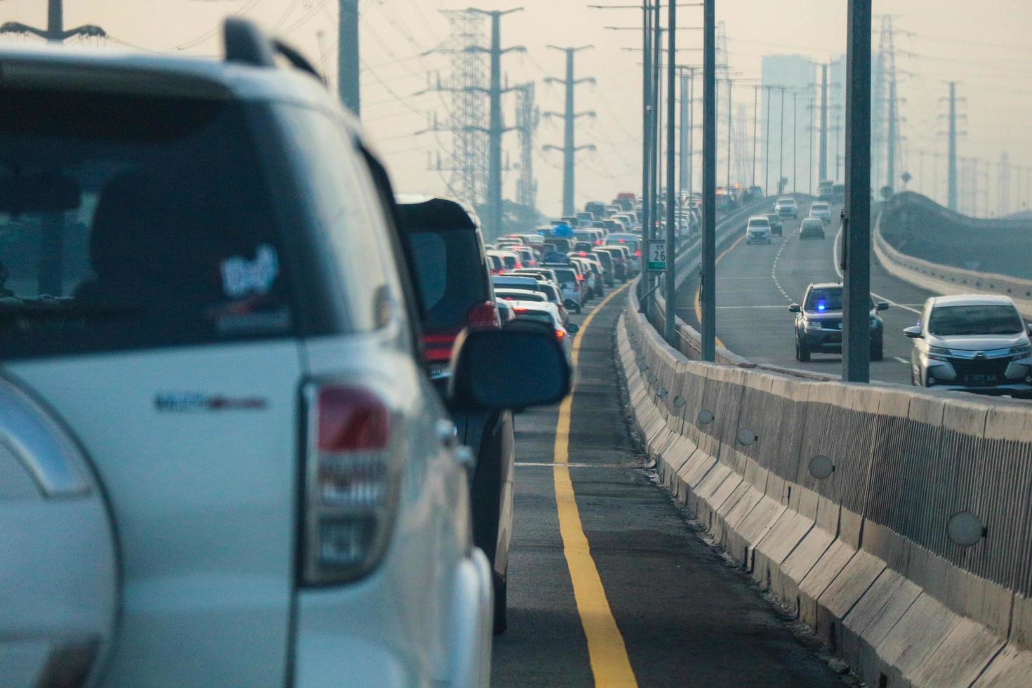 West Java, Indonesia in April 2023. The traffic jam that occurred on the Jakarta Cikampek 2 elevated toll road or known as the MBZ Mohammad Bin Zayed toll road photo