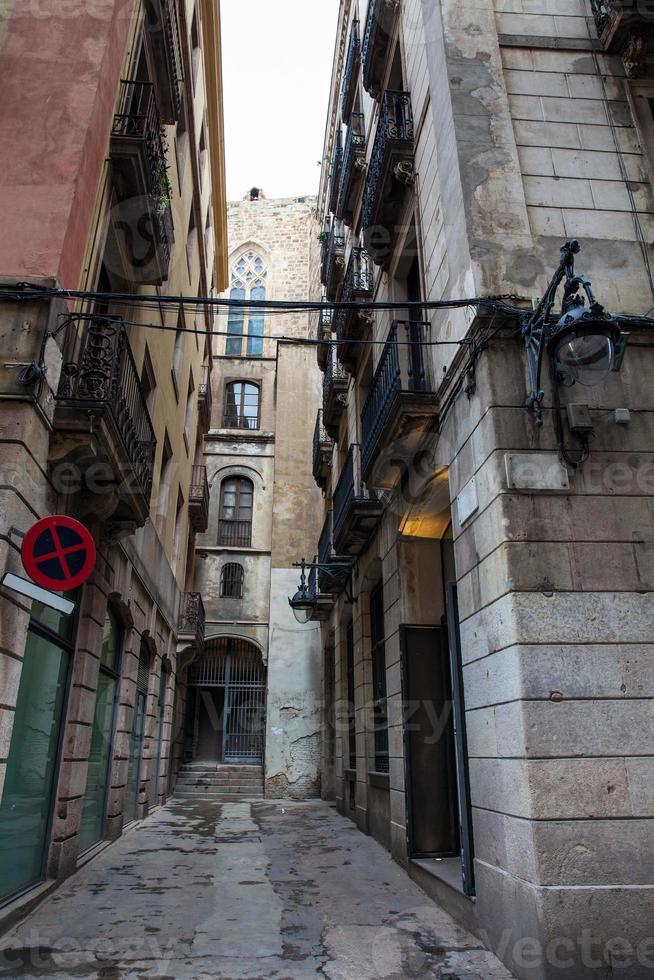 Alley at the Gothic Square in Barcelona, Spain photo