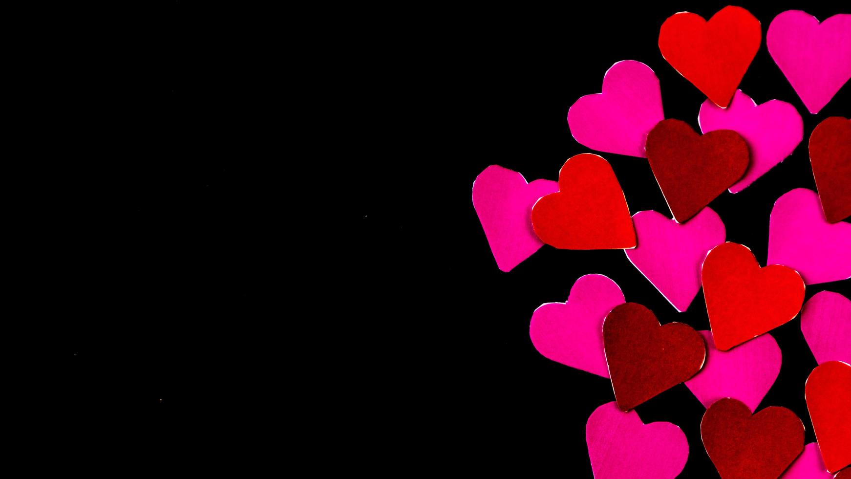 multicolored heart on black background for valentine's day photo