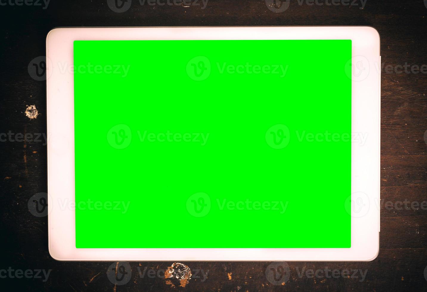 Tablet with green screen photo