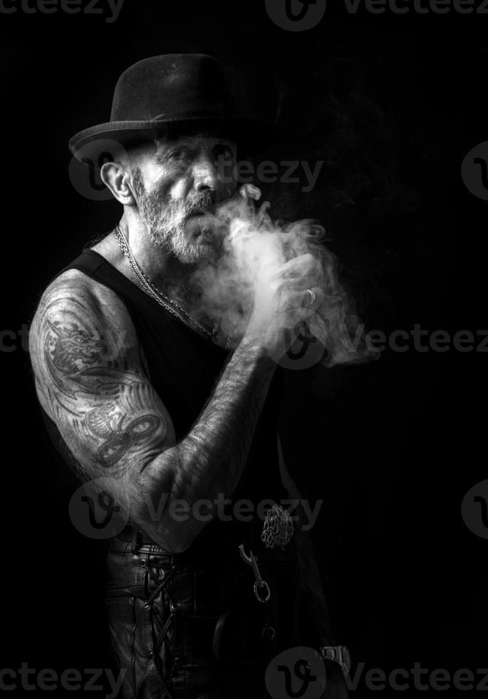 Portrait of smoking man photo