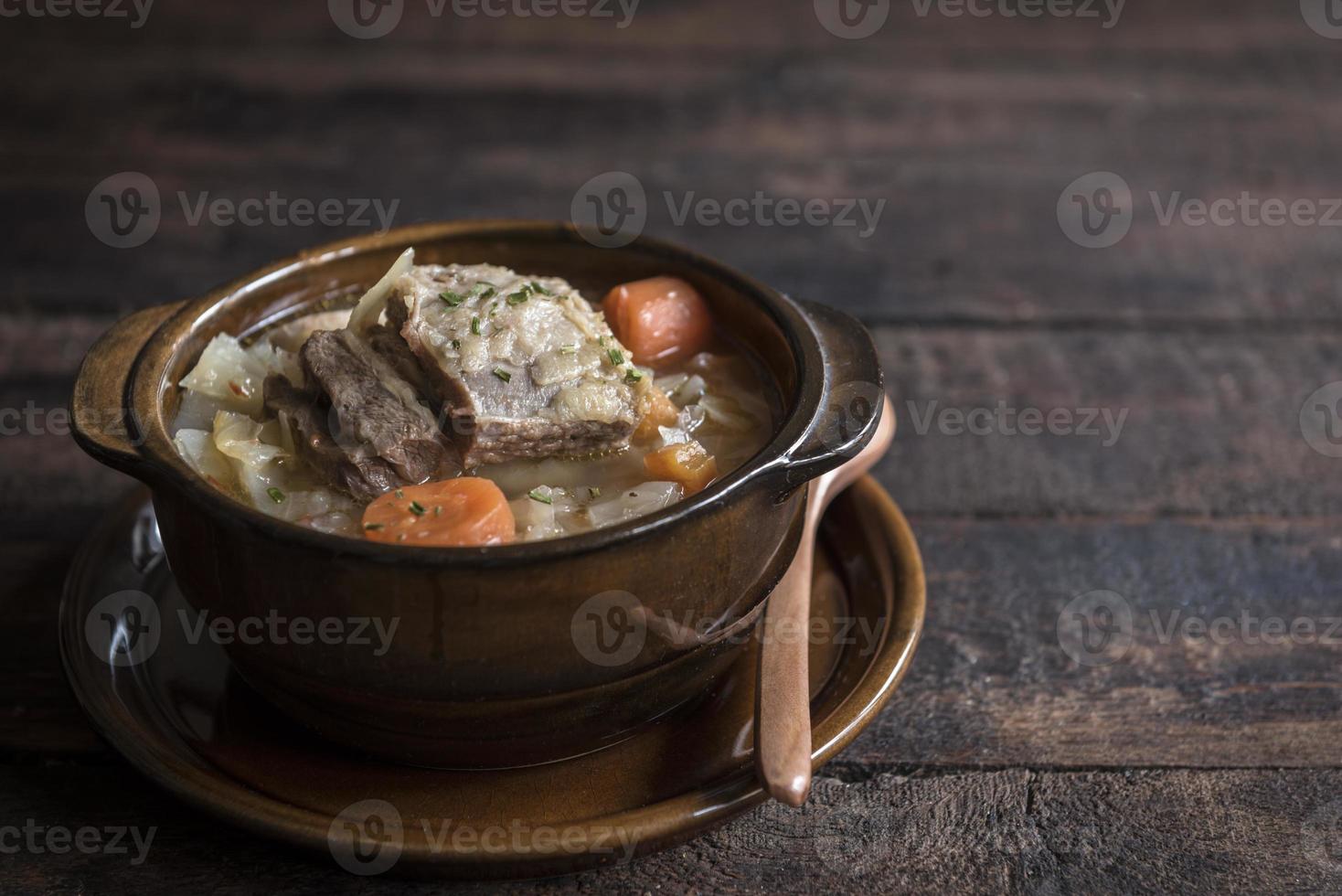 Prepared cabbage soup and ribs photo