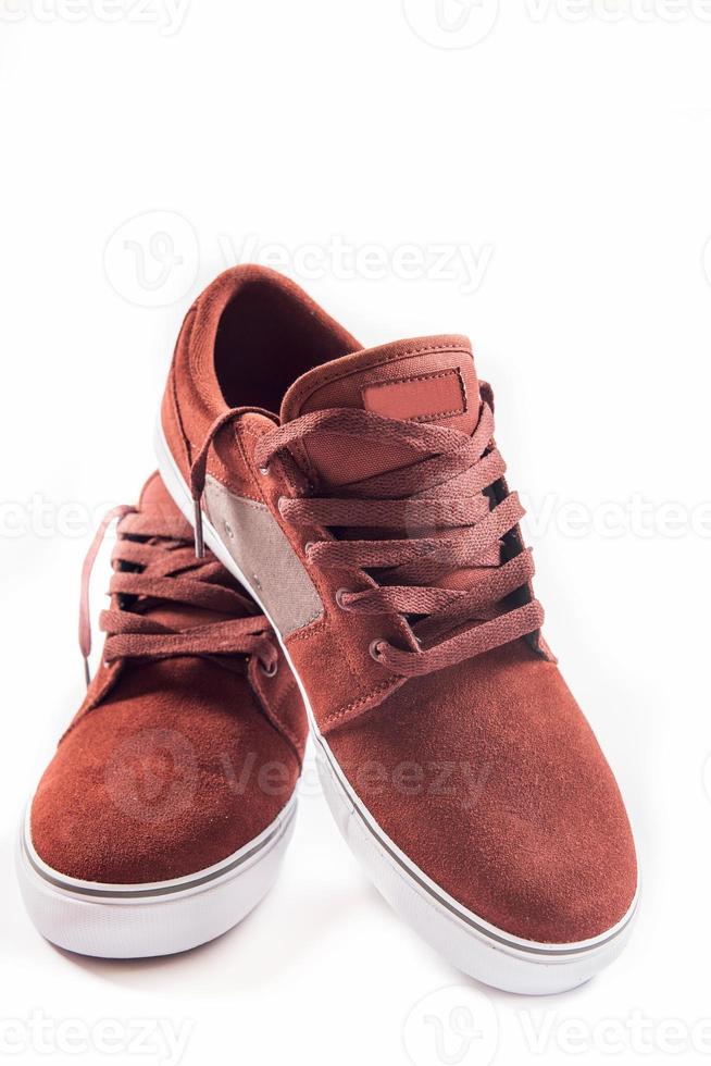 Red sneakers isolated photo