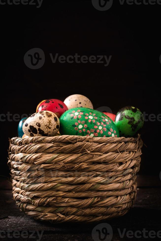 Easter eggs in the basket photo