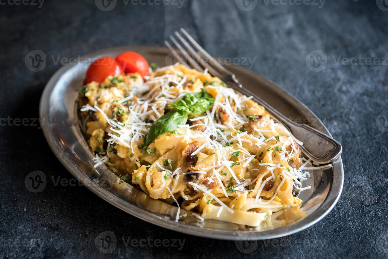 Served pasta carbonara photo