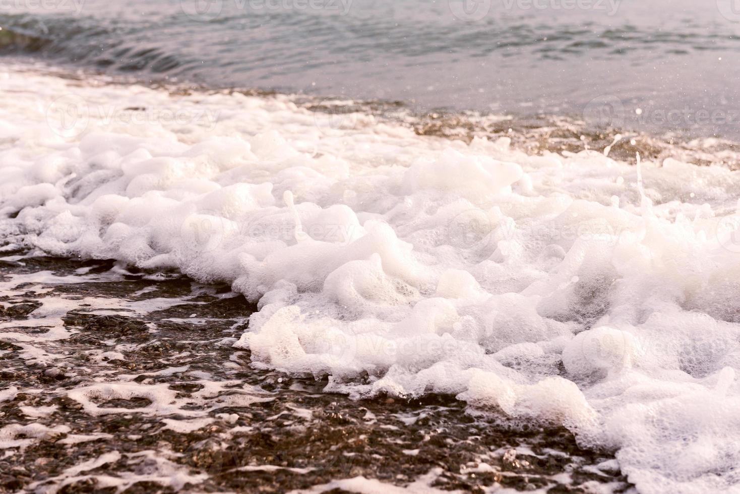 Sea water foam photo