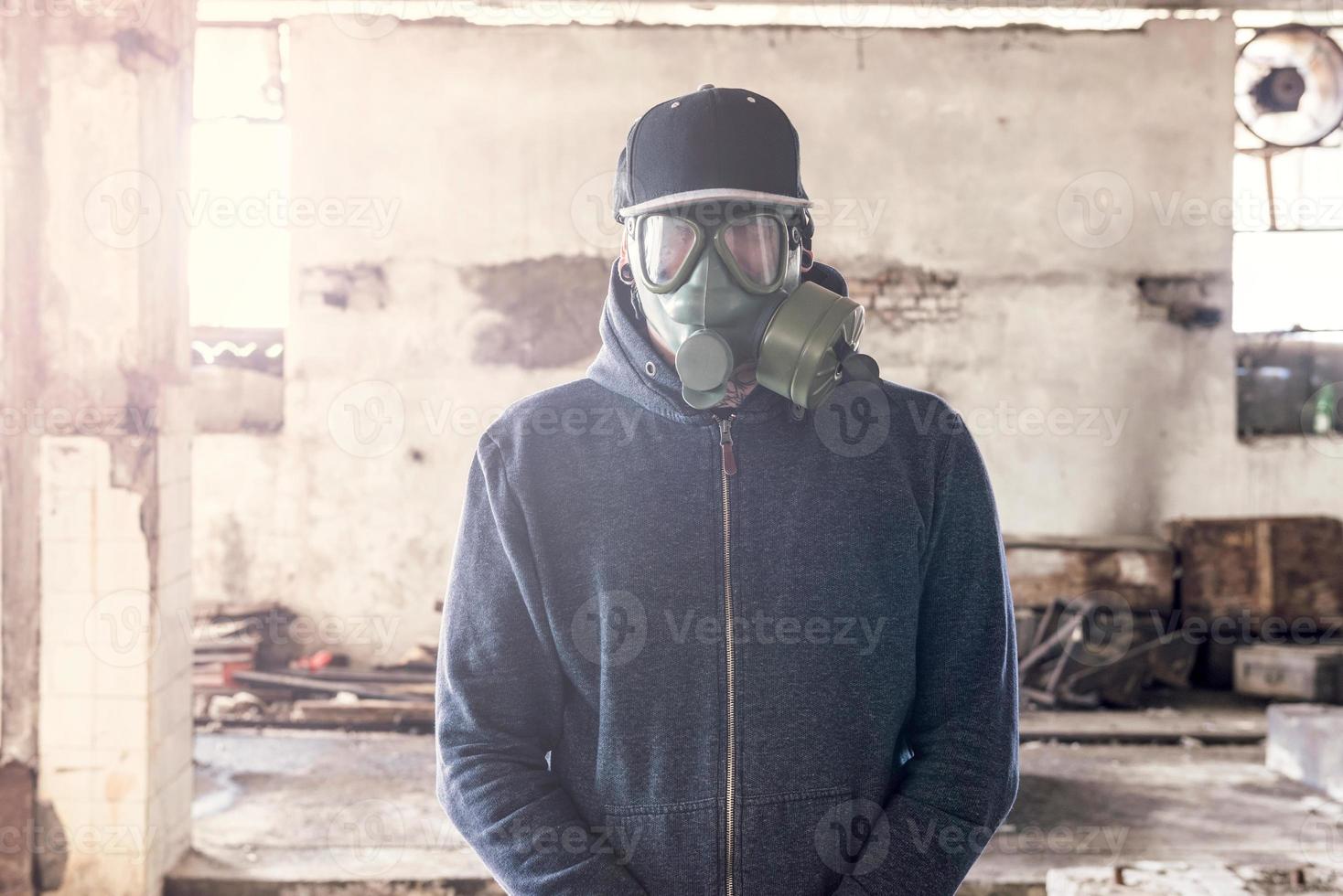 Man with gas mask photo