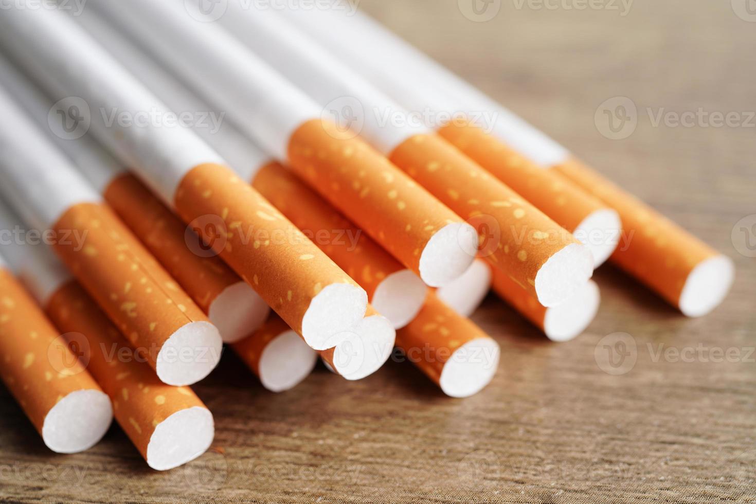 Cigarette, roll tobacco in paper with filter tube, No smoking concept. photo