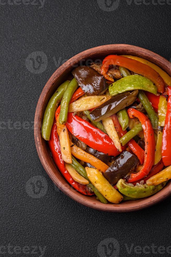 Delicious vegetables steamed peppers, asparagus beans and potatoes photo