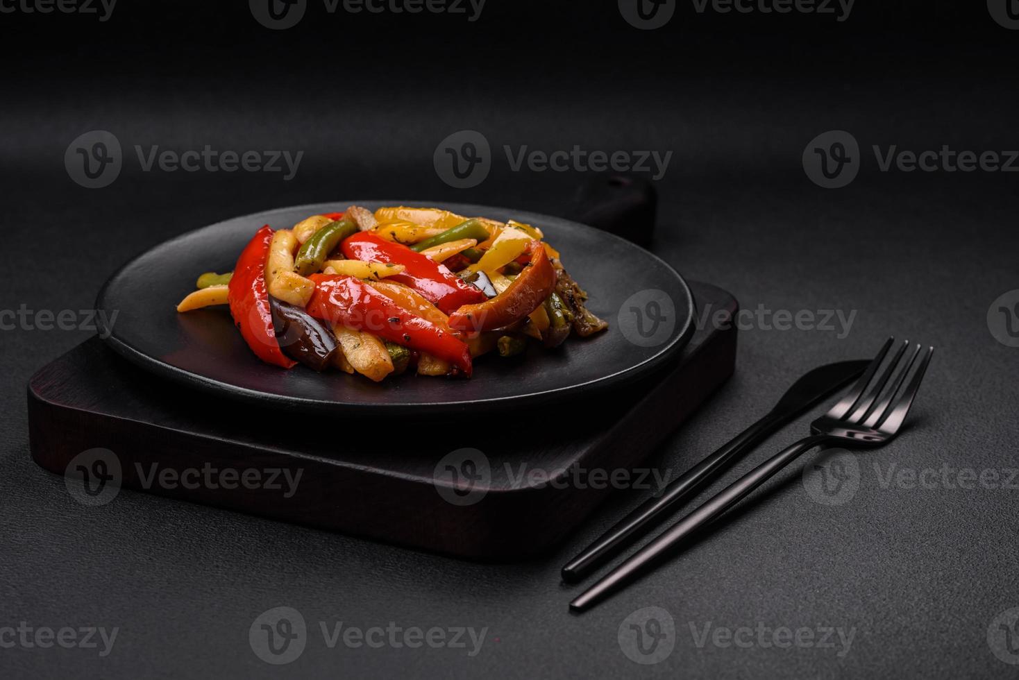 Delicious vegetables steamed peppers, asparagus beans and potatoes photo
