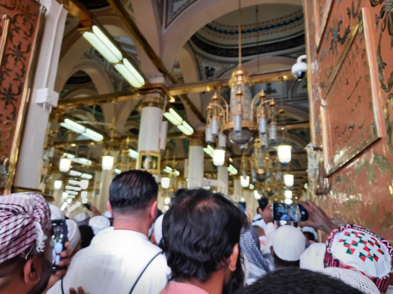 Medina, Saudi Arabia, April 2023 - Muslim pilgrims are going to visit Roza Rasool at Masjid Al Nabawi Madinah. photo