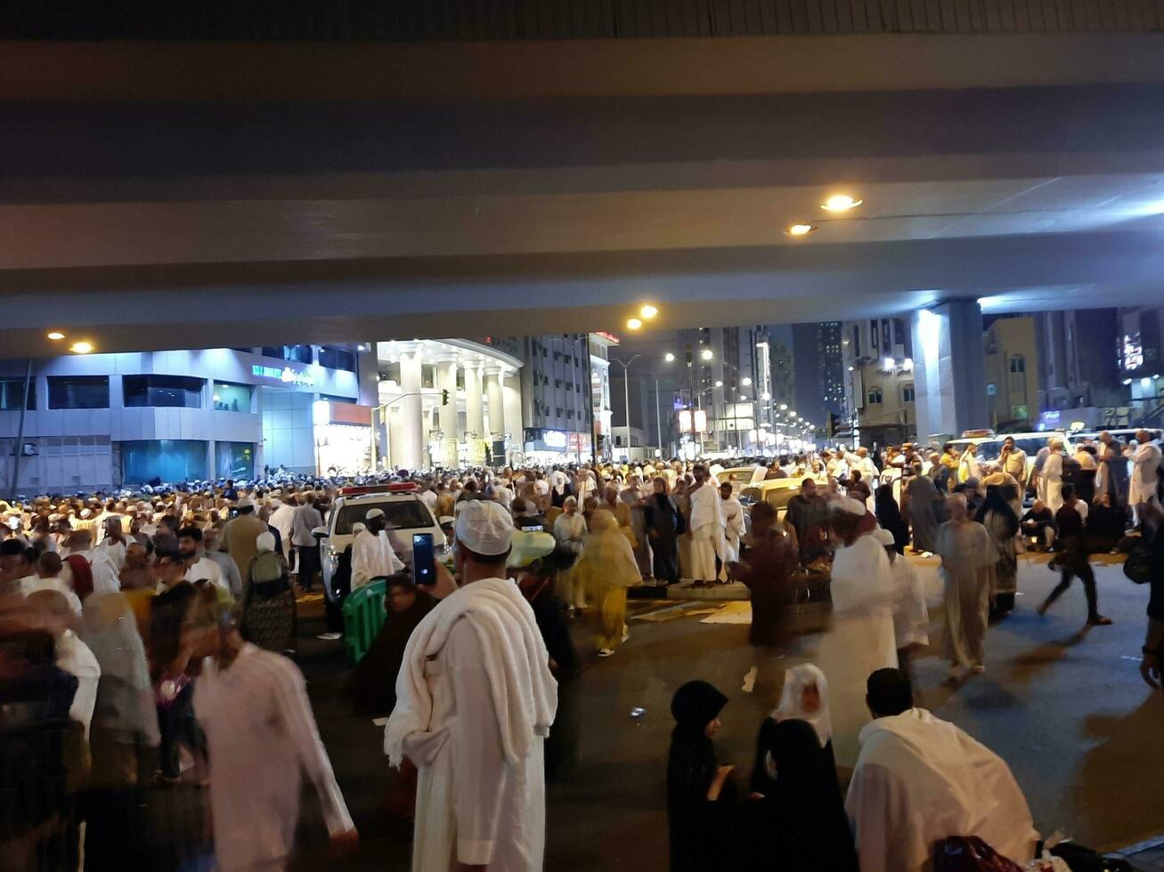 Mecca, Saudi Arabia, April 2023 - Pilgrims from different countries of the world are outside Masjid al-Haram, Makkah on the twenty-seventh night of Ramadan. photo