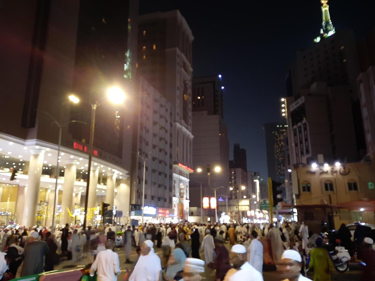 Mecca, Saudi Arabia, April 2023 - Pilgrims from different countries of the world are outside Masjid al-Haram, Makkah on the twenty-seventh night of Ramadan. photo