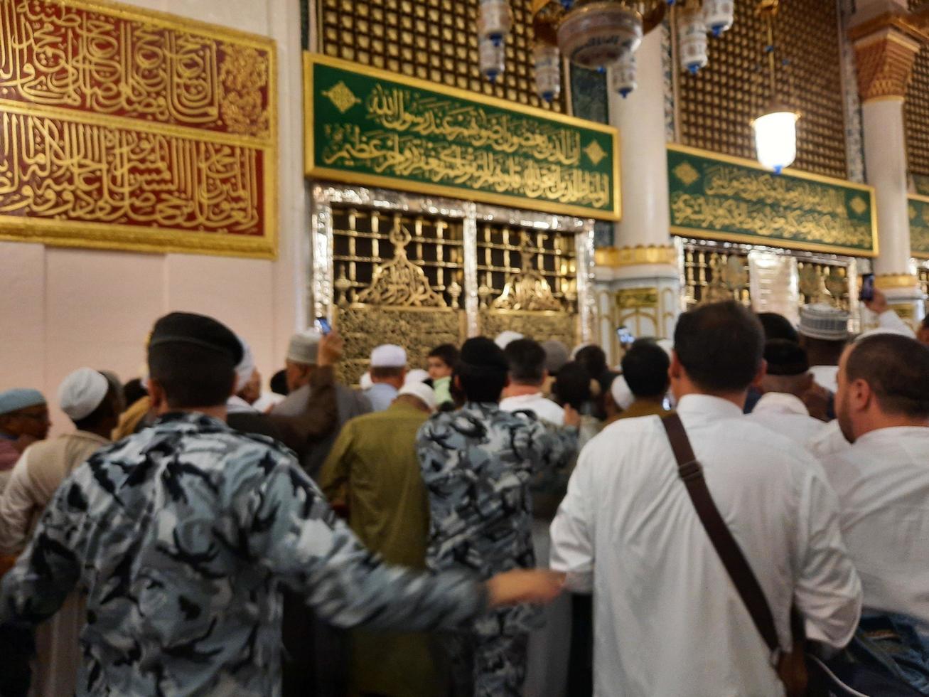 Medina, Saudi Arabia, April 2023 - Muslim pilgrims are going to visit Roza Rasool at Masjid Al Nabawi Madinah. photo