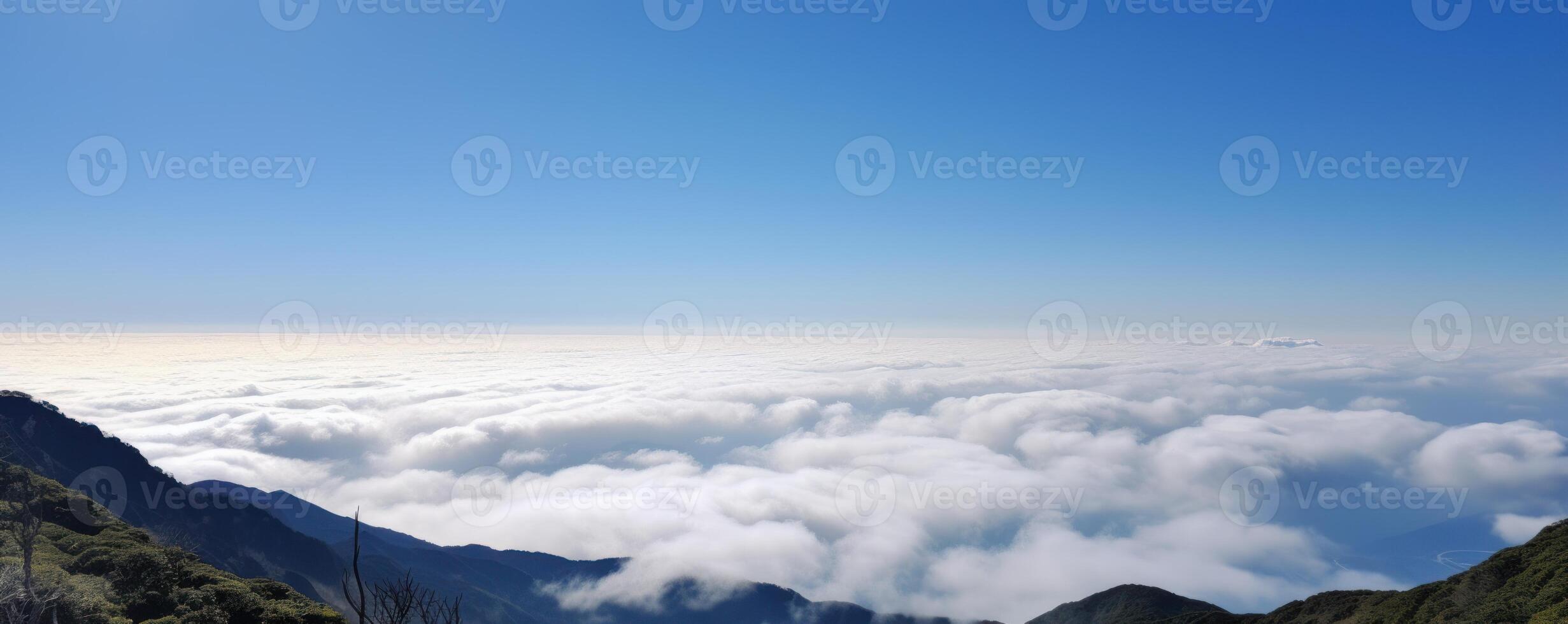 Sea of clouds with blue sky background. photo