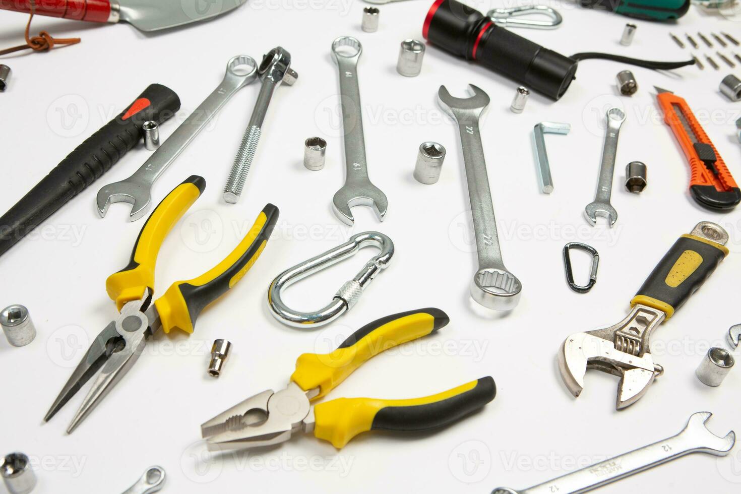 Set of tools for repair in a case on a white background. Assorted work or construction tools. Wrenches, Pliers, screwdriver. Top view photo