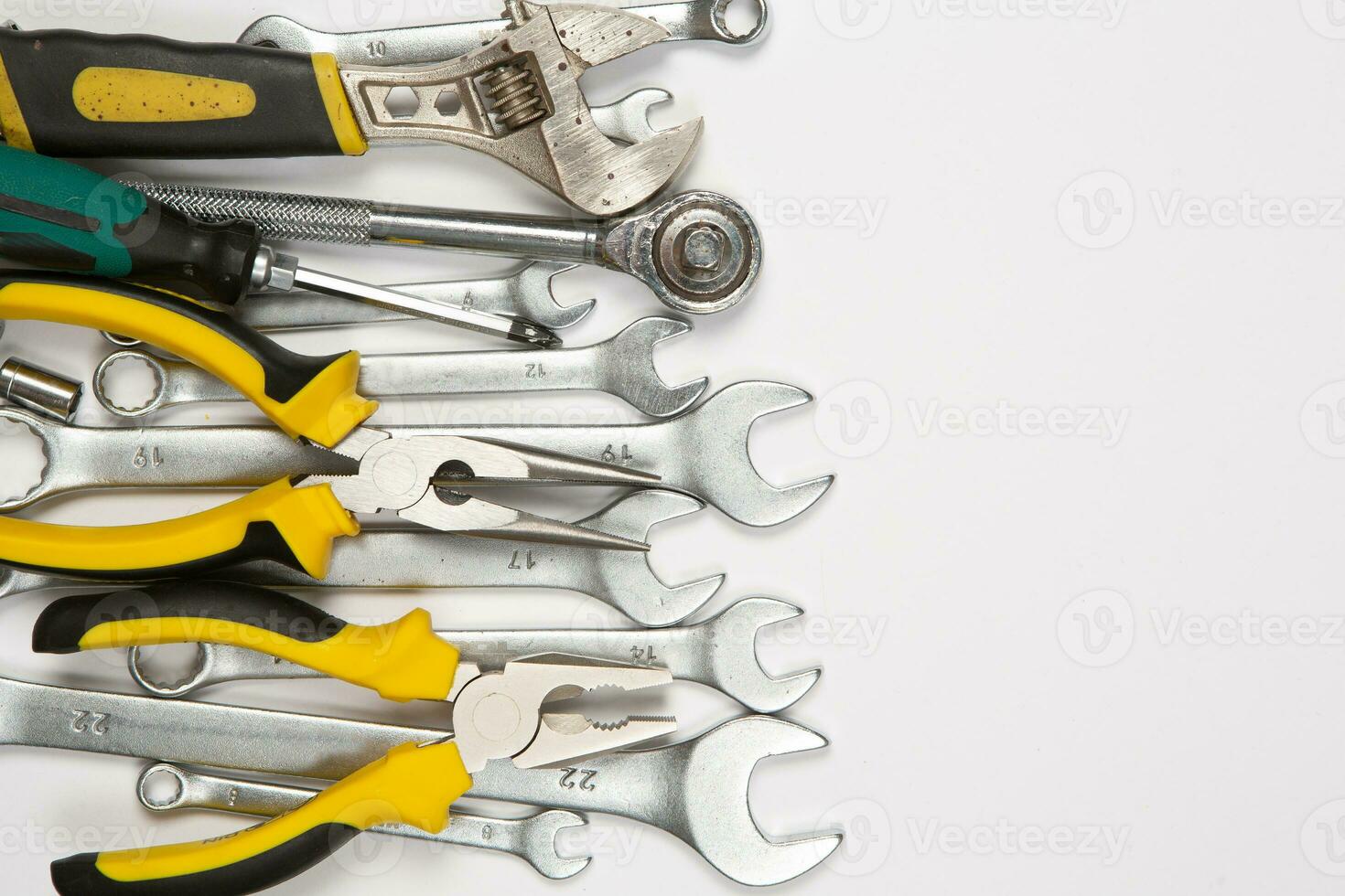 Set of tools for repair in a case on a white background. Assorted work or construction tools. Wrenches, Pliers, screwdriver. Top view photo