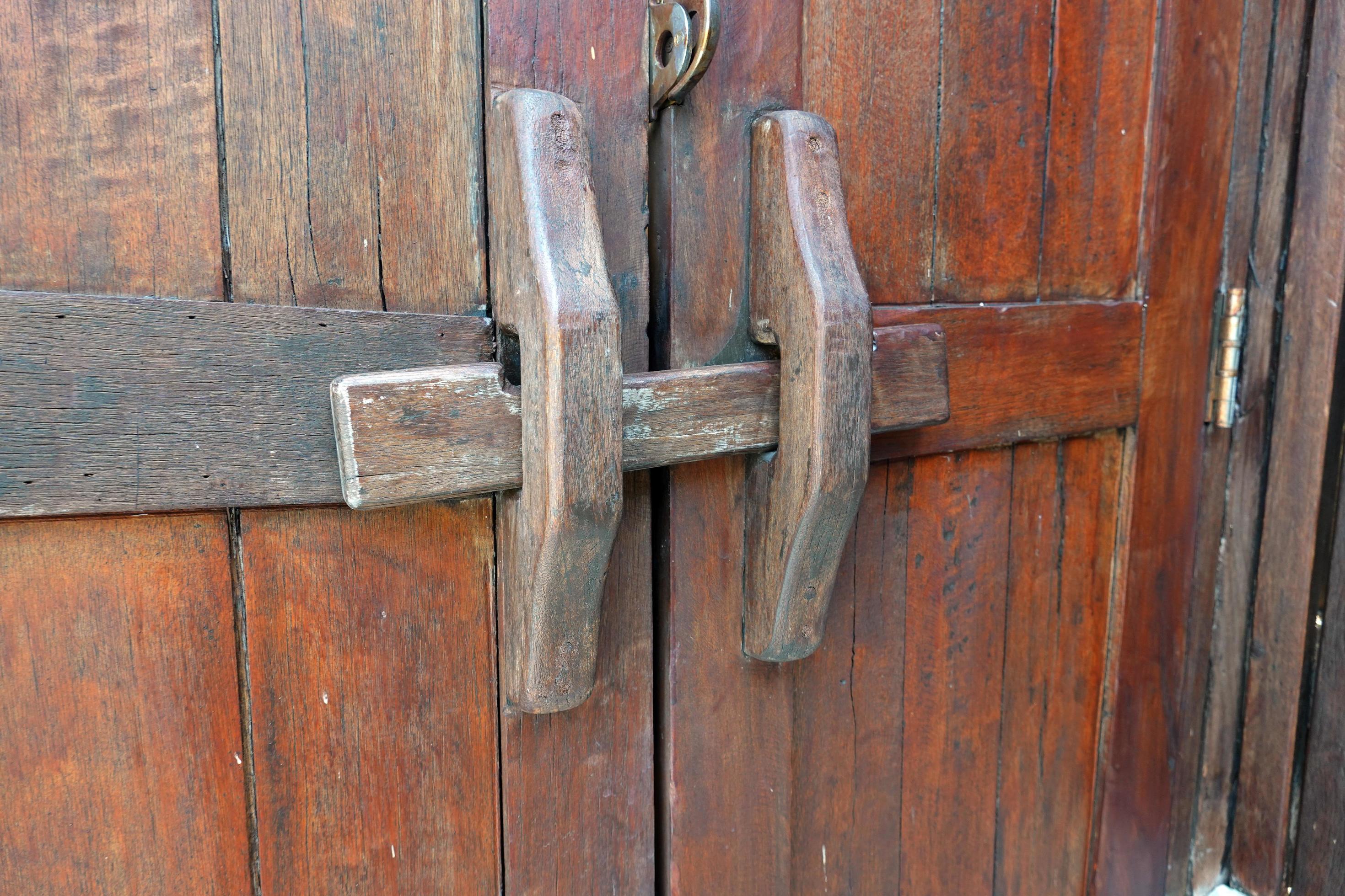 handmade wooden lock or ancient door latch. Thailand traditional wood