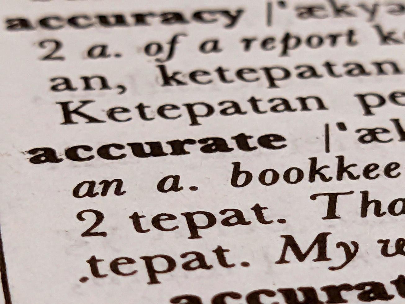 a close up of the word accurate in the English to Indonesian dictionary. For word background or wallpaper photo