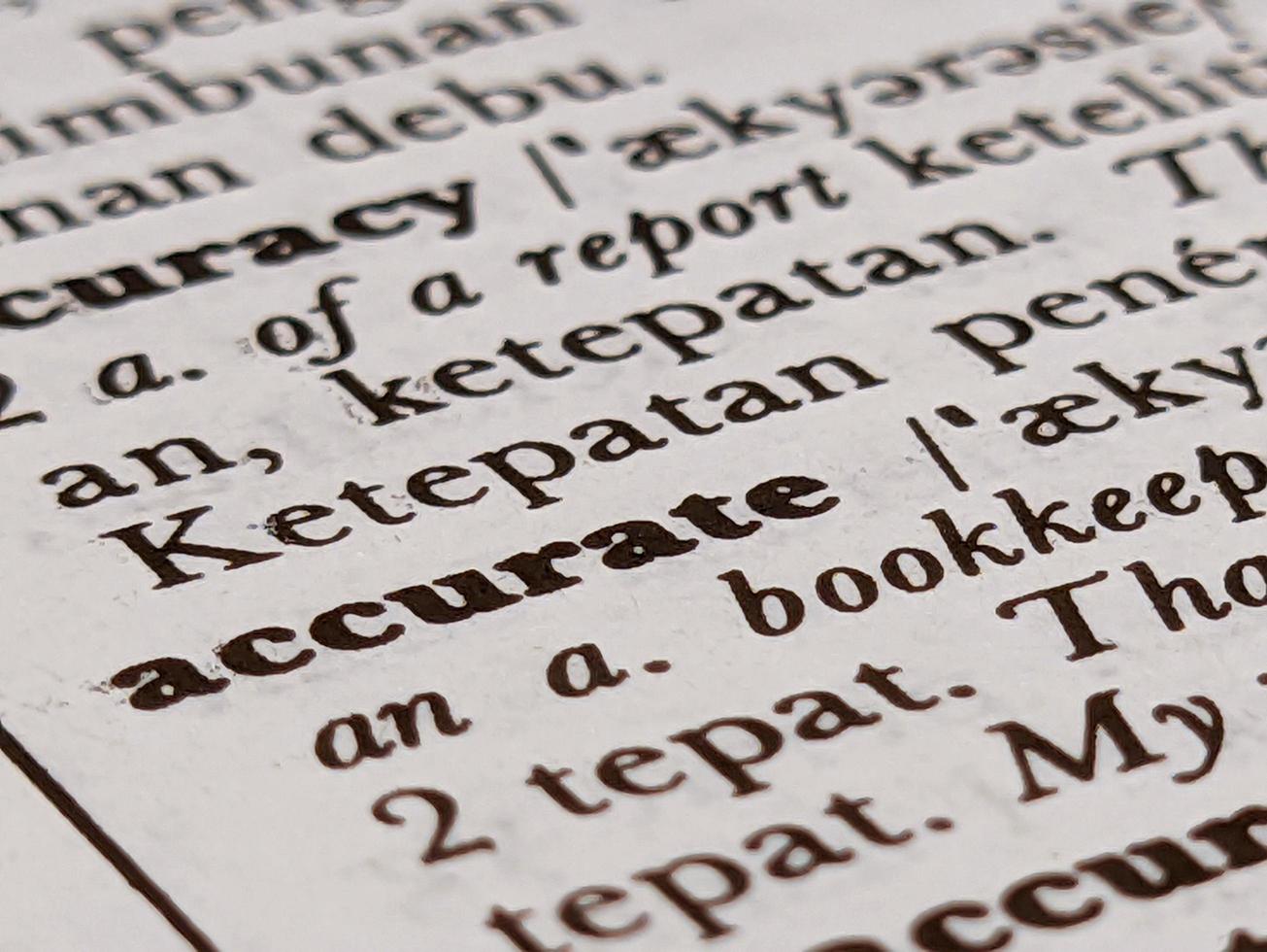a close up of the word accurate in the English to Indonesian dictionary. For word background or wallpaper photo
