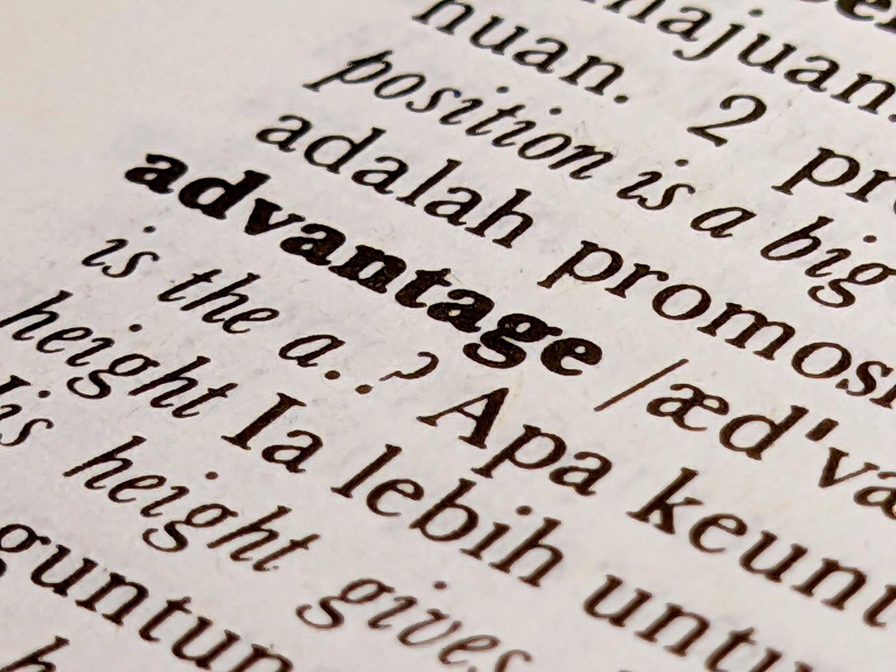 a close up of the word advantage in the English to Indonesian dictionary. For word background or wallpaper photo