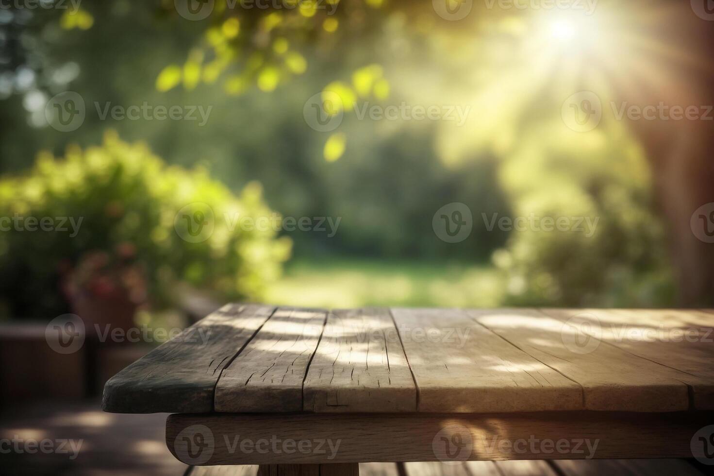 Empty wooden table for product display with blurred garden background. photo