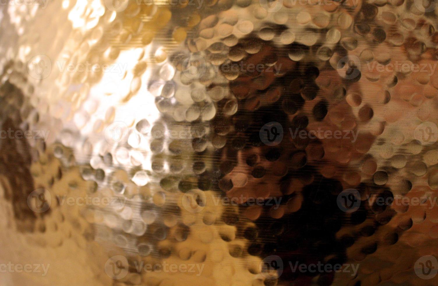 Reflective Hammered Metal Decorative Pot photo