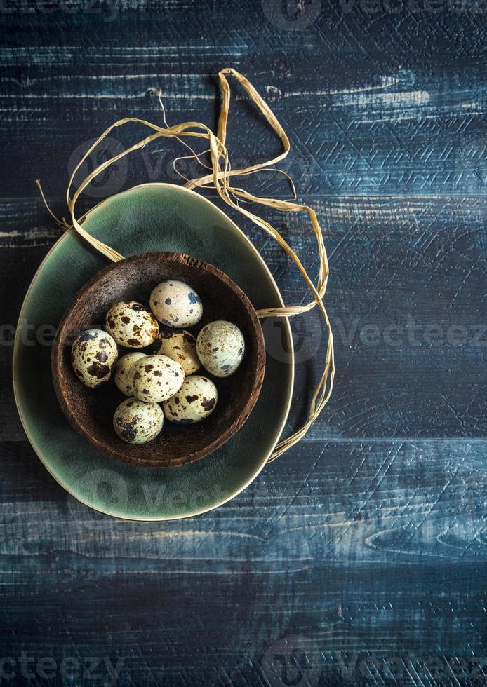 Quail eggs in bowl photo