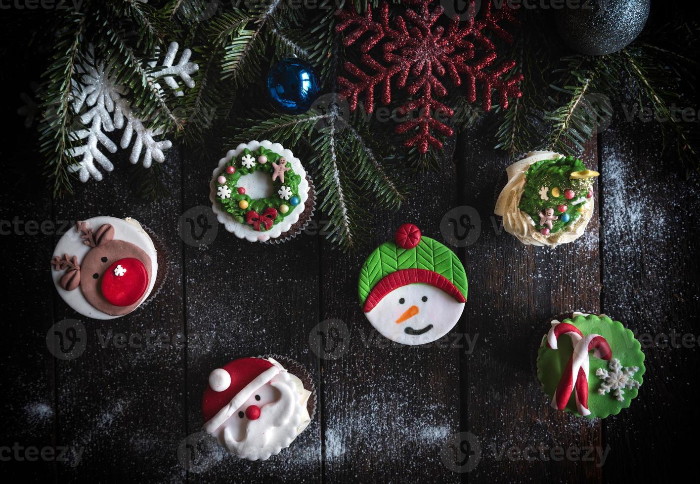 Cup cakes with Christmas decoration photo
