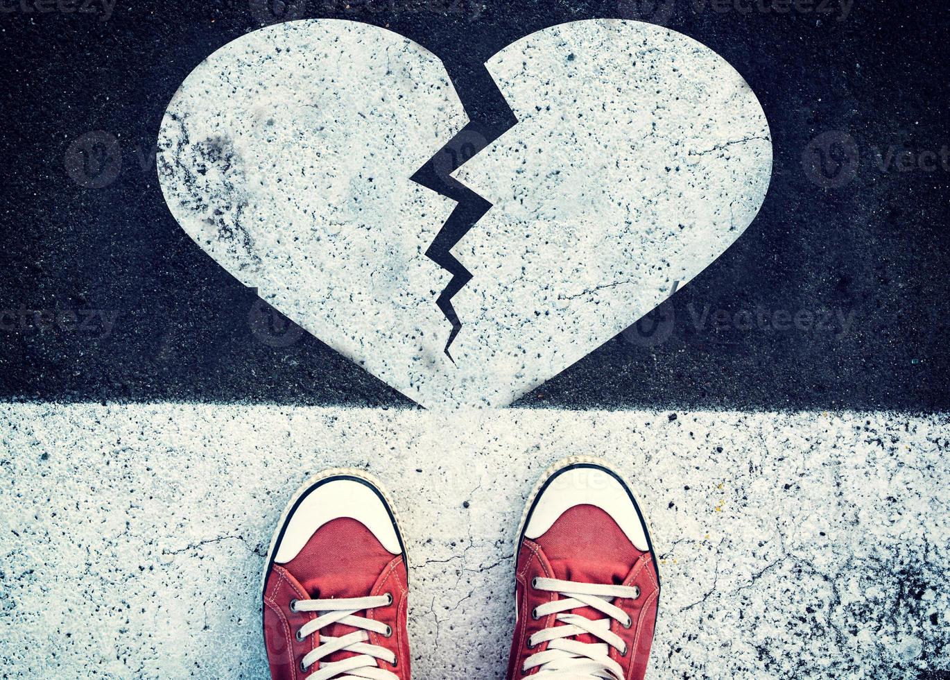 Broken heart sign on the road photo