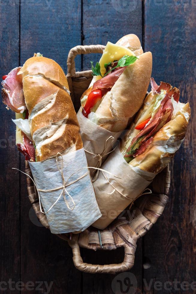 Submarine sandwiches in the basket photo