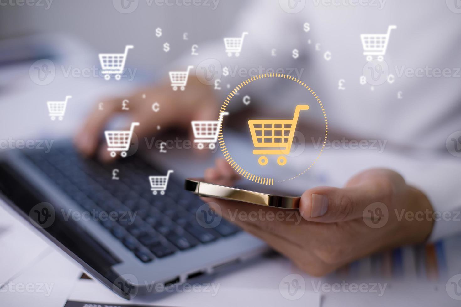 Businessman hold smartphone with online shopping concept, marketplace website with virtual interface of online Shopping cart part of the network, Online shopping business with selecting shopping cart. photo