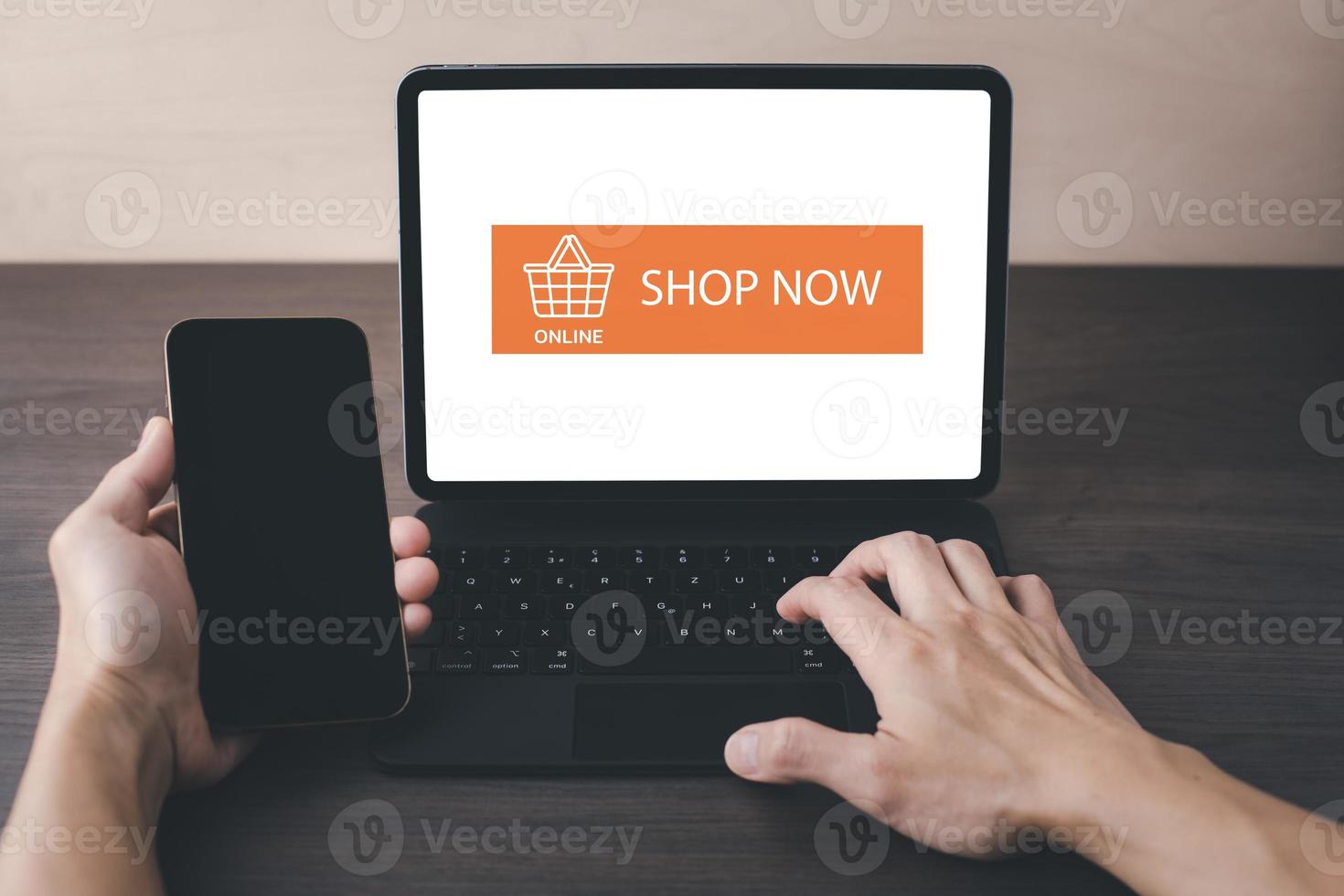 Online shopping with laptop computer concept, Hand hold smartphone and laptop for online shopping showing payment details, E-commerce shop ecommerce website with smartphone shopping cart online photo