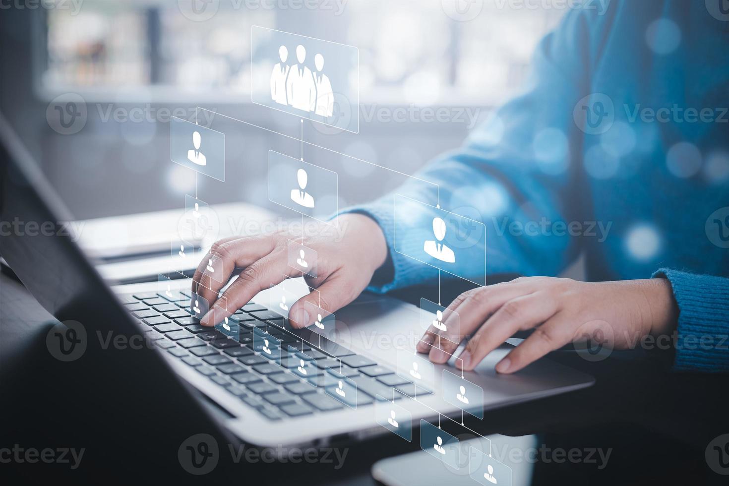Customer Relationship Management ,Businessman using laptop with human global structure , Data exchanges development. customer service, social media, digital marketing online,Social Internet network,HR photo