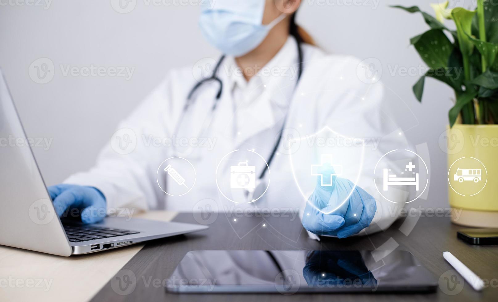 Medical doctor and medical technology and futuristic concept, Doctor with stethoscope and medical network connection icon on virtual screen interface.Modern medical technology and innovation concept. photo