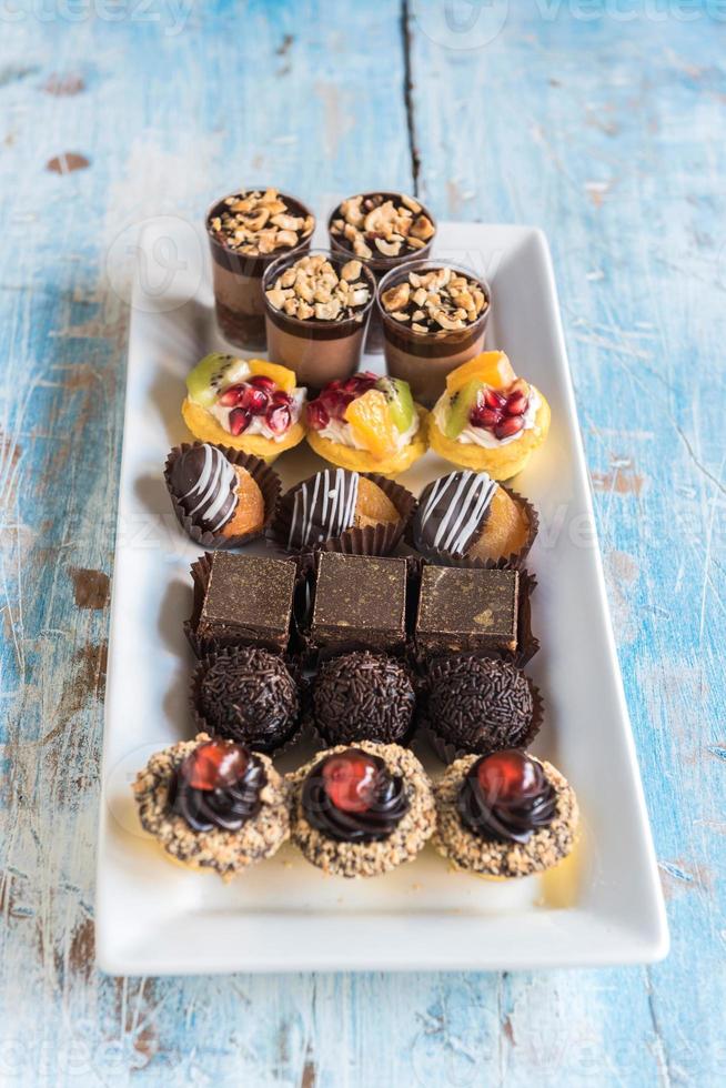 Assorted mini cakes photo