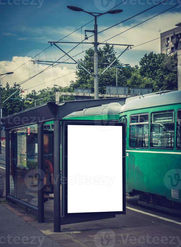 Blank billboard on tram station photo